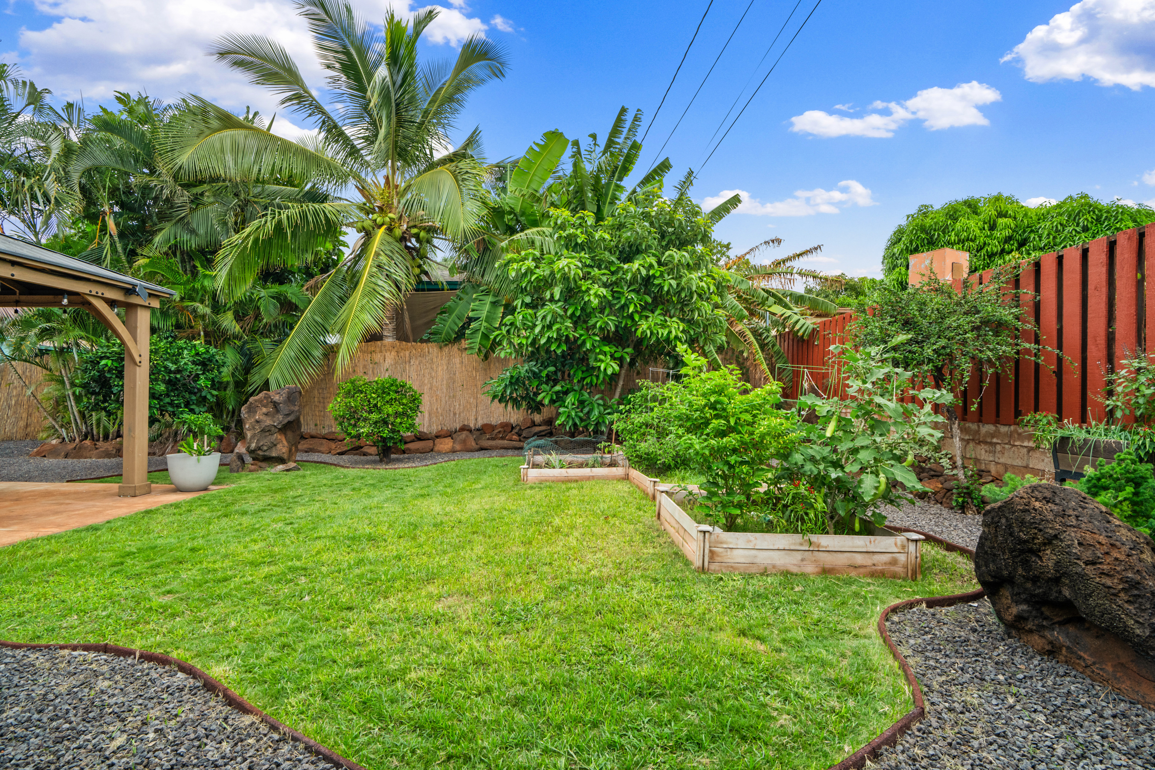 9639 Maule Road Waimea, HI 96796 - Photo 5 of 29 a view of a backyard with a garden
