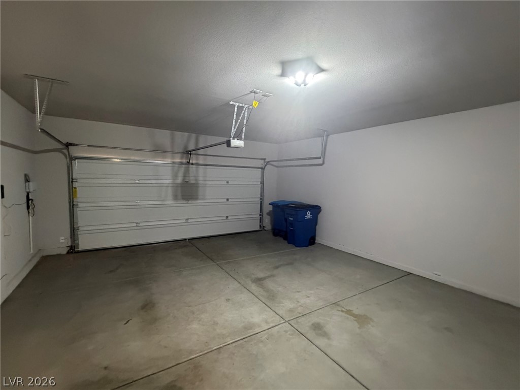 9953 Tucket Point Court Las Vegas, NV 89178 - Photo 11 of 22 Secure parking and ample storage space are provided in this functional garage.