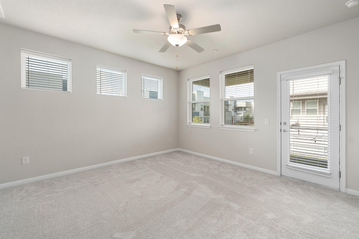 9015 Cattle Baron Path, Unit 1905 Austin, TX 78747 - Photo 14 of 40 a view of an empty room with a window