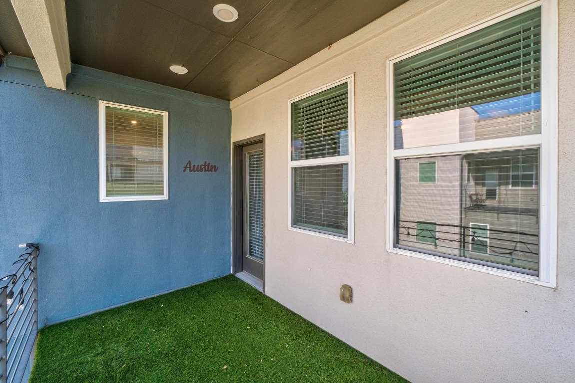 9015 Cattle Baron Path, Unit 1905 Austin, TX 78747 - Photo 18 of 40 a view of an front of house with a yard
