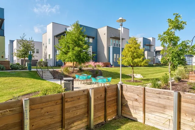 a view of an chairs and tables in the patio
