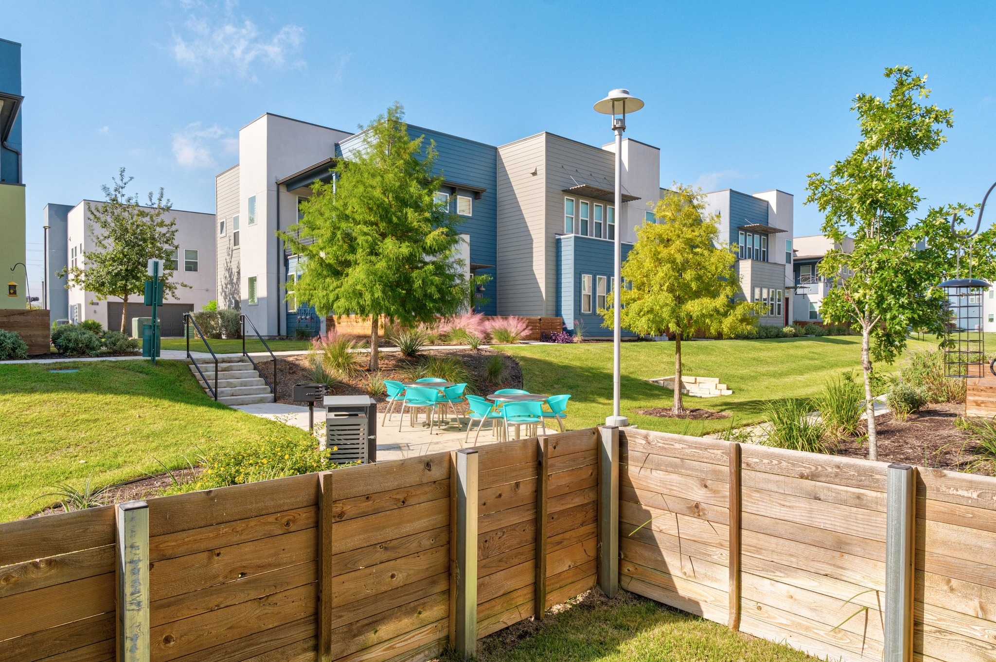 9015 Cattle Baron Path, Unit 1905 Austin, TX 78747 - Photo 3 of 40 a view of an chairs and tables in the patio