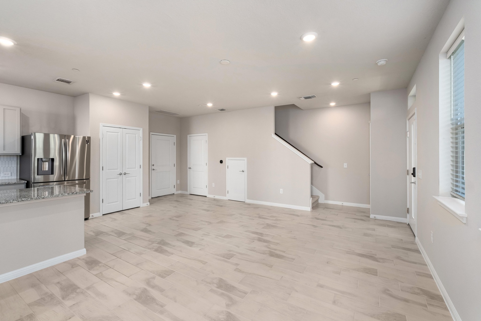 9015 Cattle Baron Path, Unit 1905 Austin, TX 78747 - Photo 8 of 40 an empty room with closet and windows