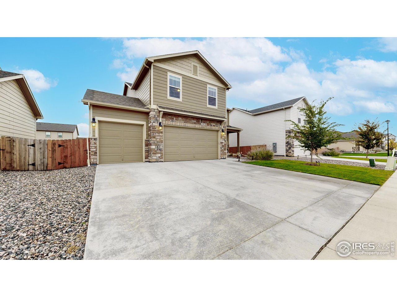 933 Keneally Court Windsor, CO 80550 - Photo 32 of 40 a black and white photo of a house