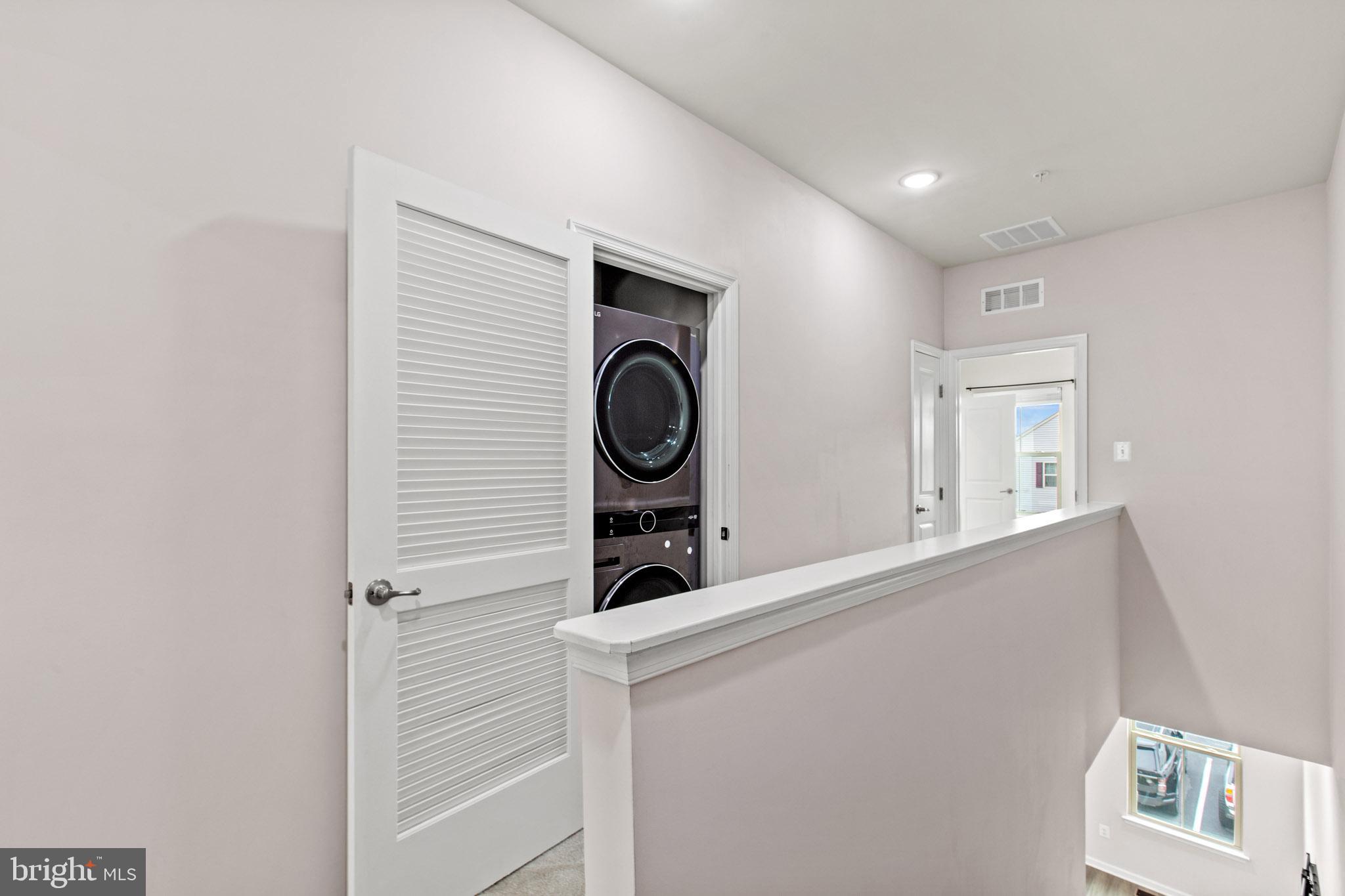 3753 Valley Ford Way Hanover, MD 21076 - Photo 22 of 35 a view of living room washer and dryer