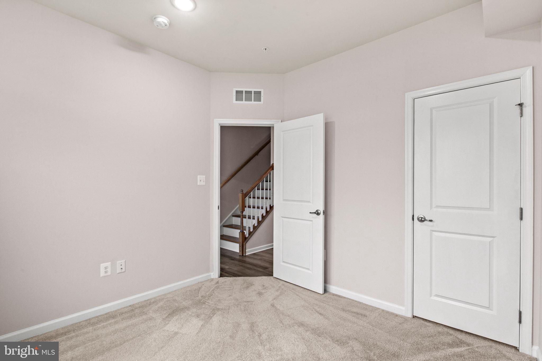 3753 Valley Ford Way Hanover, MD 21076 - Photo 7 of 35 an empty room with windows and closet