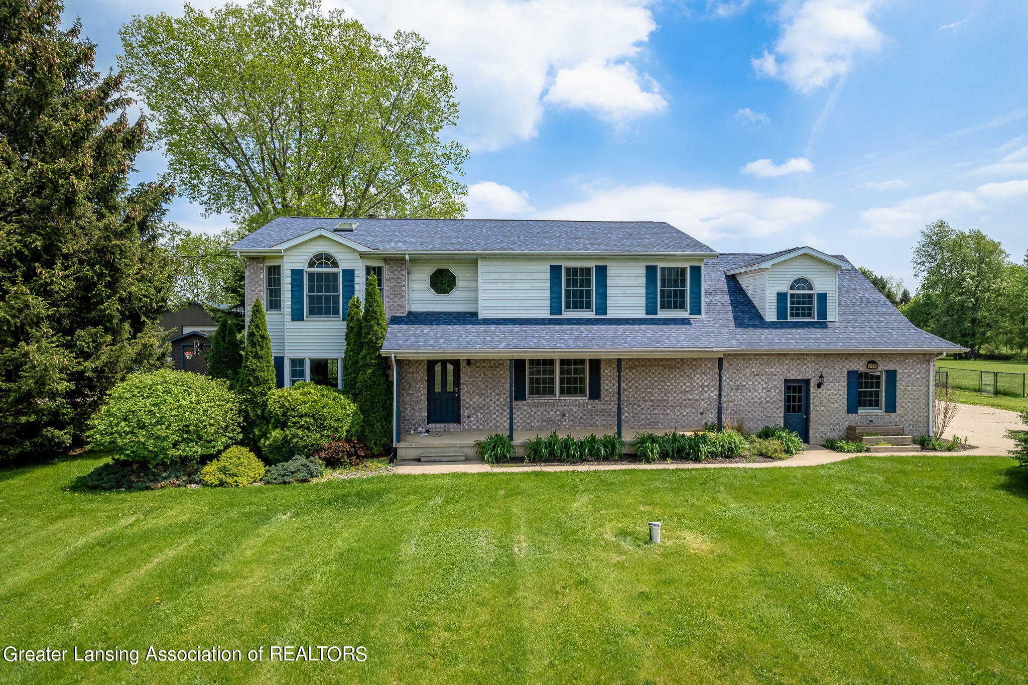 2440 Gilbert Road Lansing, MI 48911 - Photo 1 of 47 Exterior Front