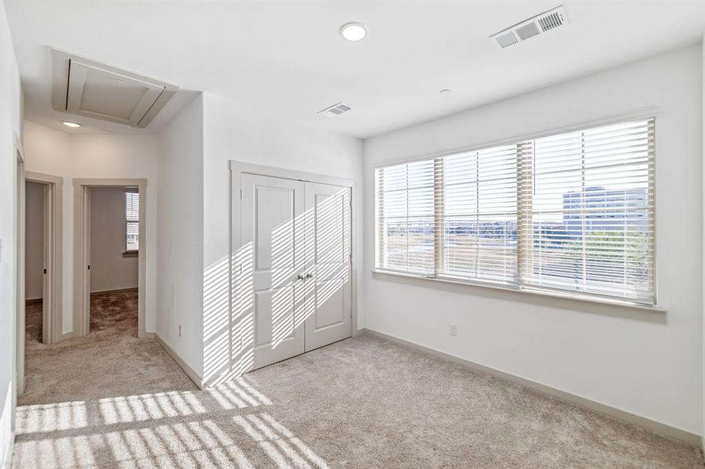 699 Vista Oak Road Lewisville, TX 75067 - Photo 17 of 35 a view of an empty room with a window