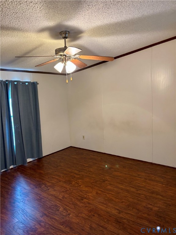 1225 Beech Forest Road Kenbridge, VA 23944 - Photo 14 of 33 a view of an empty room with wooden floor