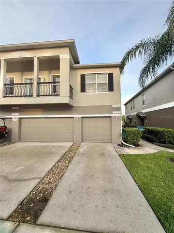 a view of a house with a swimming pool