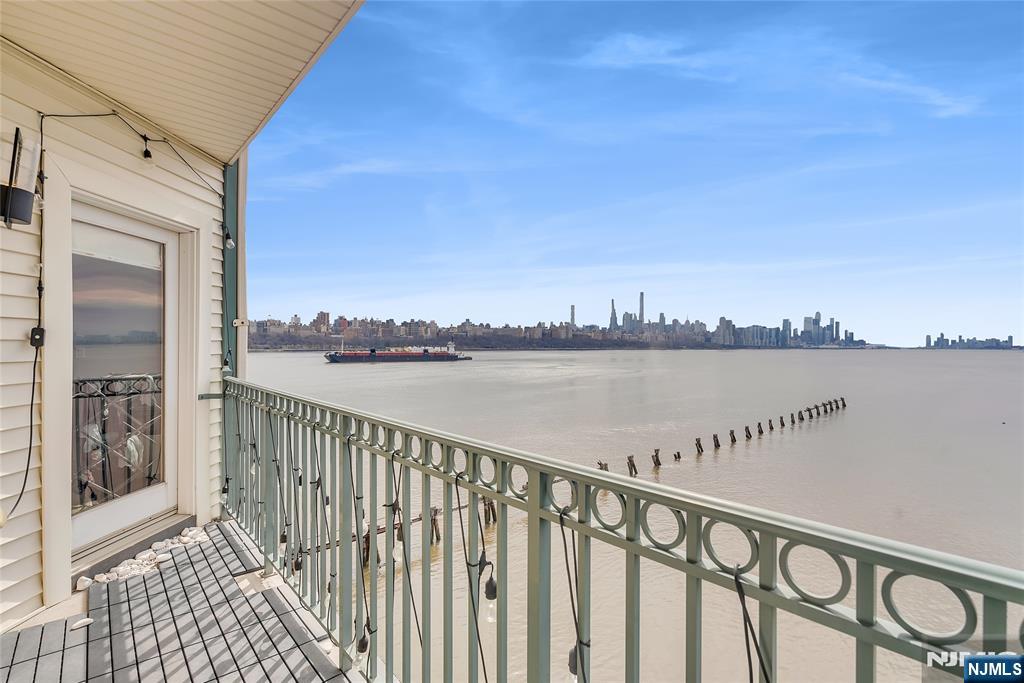 314 The Promenade Edgewater, NJ 07020 - Photo 13 of 37 a view of a street from a balcony