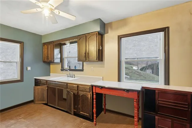 a spacious bathroom with a double vanity sink and a mirror