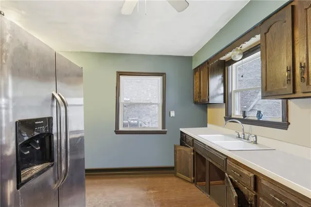 a bathroom with a double vanity sink and mirror