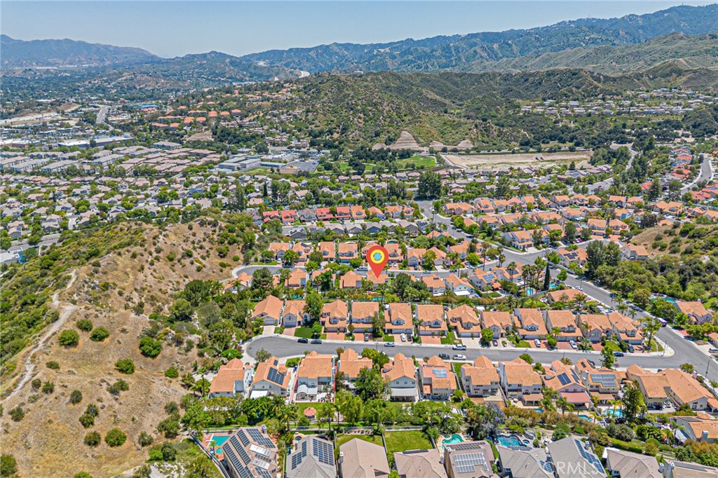 25533 Longfellow Place Stevenson Ranch, CA 91381 - Photo 42 of 47 an aerial view of residential houses and outdoor space
