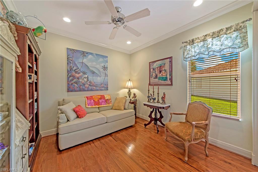 20483 Foxworth Circle Estero, FL 33928 - Photo 16 of 25 a living room with furniture and a window