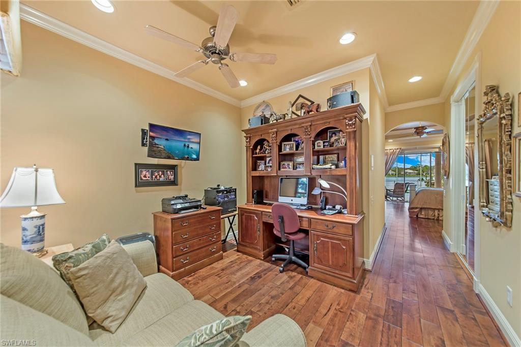 20483 Foxworth Circle Estero, FL 33928 - Photo 18 of 25 a living room with furniture and wooden floor