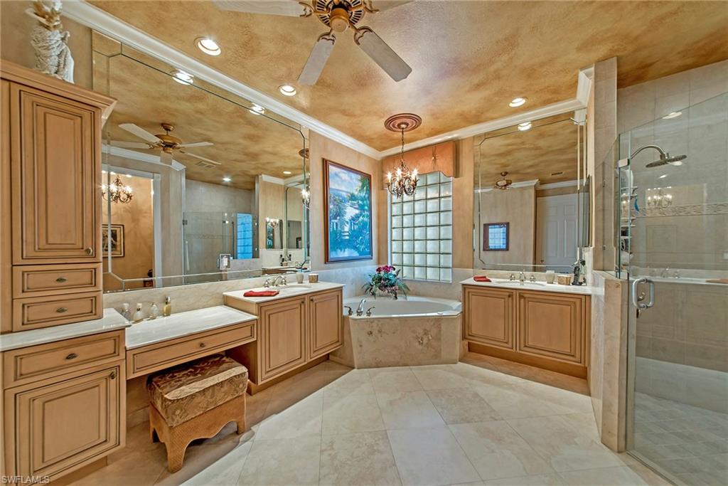 20483 Foxworth Circle Estero, FL 33928 - Photo 19 of 25 a large white kitchen with a large window