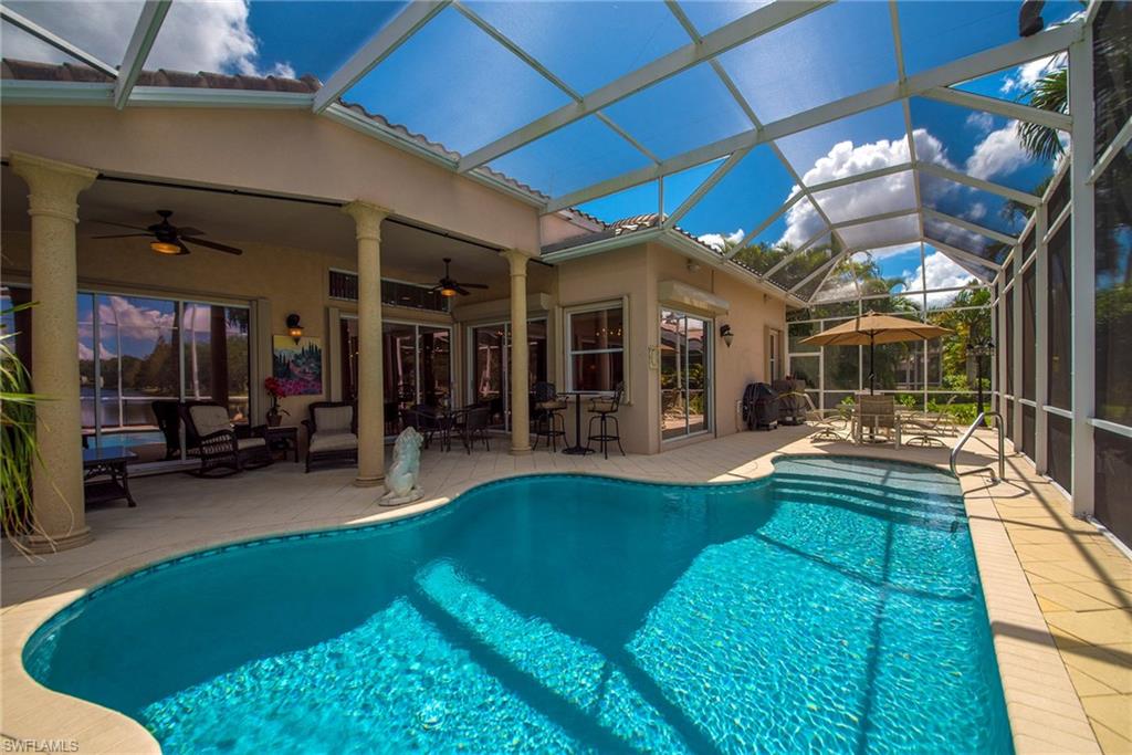 20483 Foxworth Circle Estero, FL 33928 - Photo 21 of 25 a view of a house with swimming pool and sitting area