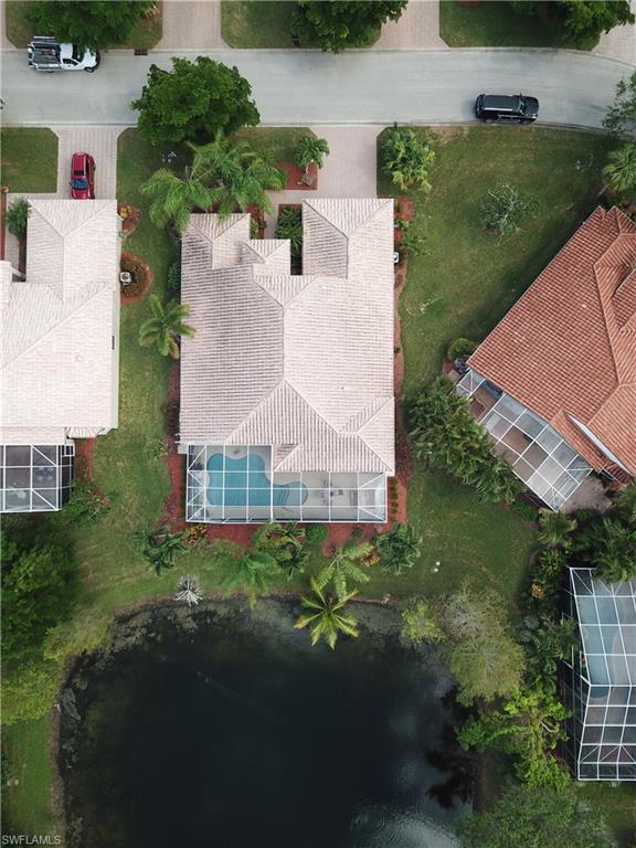 20483 Foxworth Circle Estero, FL 33928 - Photo 25 of 25 an aerial view of a house with a garden and yard