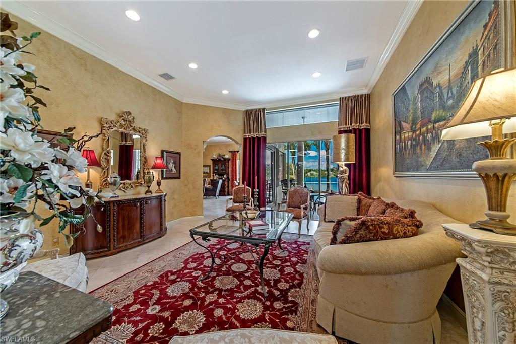 20483 Foxworth Circle Estero, FL 33928 - Photo 6 of 25 a living room with furniture and a flat screen tv