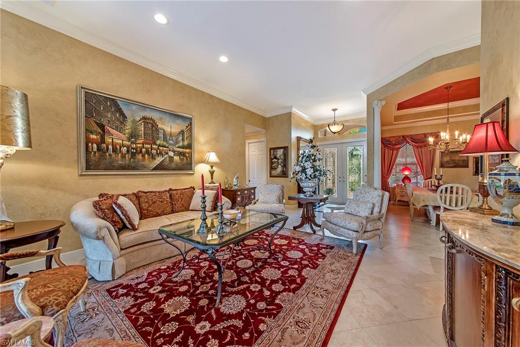 20483 Foxworth Circle Estero, FL 33928 - Photo 7 of 25 a living room with furniture and a rug