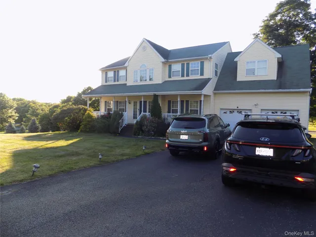 a car parked in front of a house