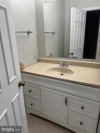 a bathroom with a toilet a sink and a shower