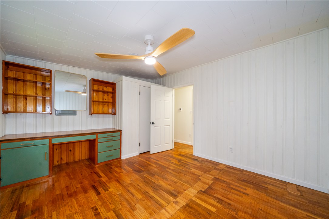 11296 Pansing Road Brookville, OH 45309 - Photo 28 of 53 This spacious bedroom features warm wood flooring and a refreshing ceiling fan for ultimate comfort.