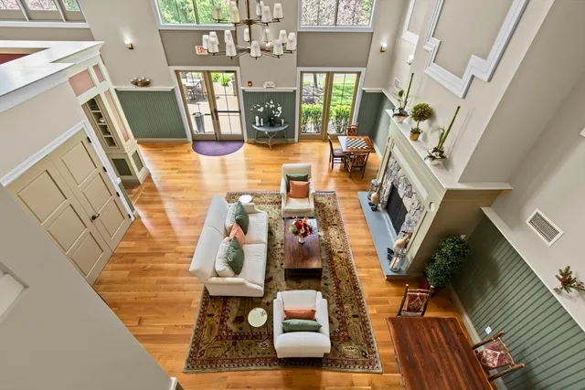 a view of living room with furniture and rug floor
