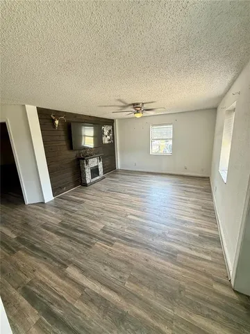 a view of a livingroom with wooden floor