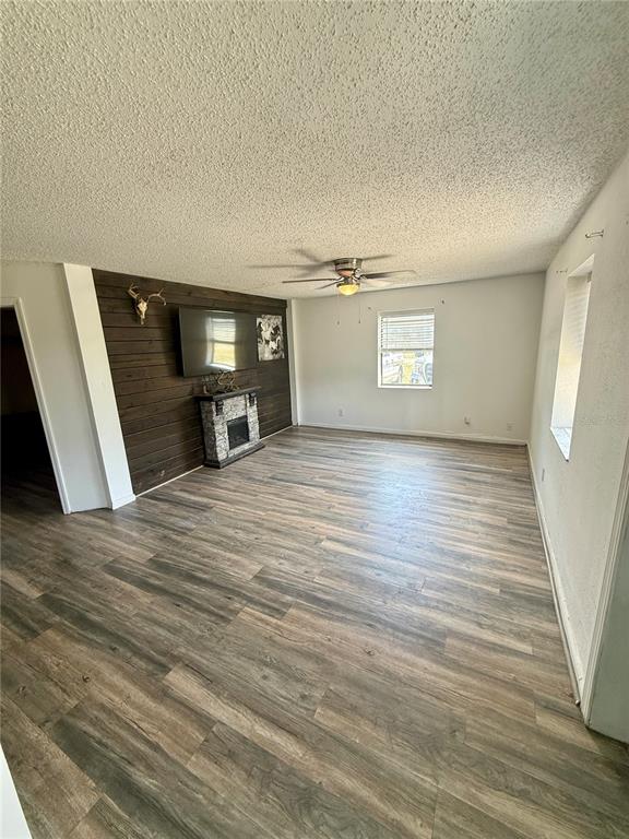 439 Corbett Road Lithia, FL 33547 - Photo 4 of 27 a view of a livingroom with wooden floor