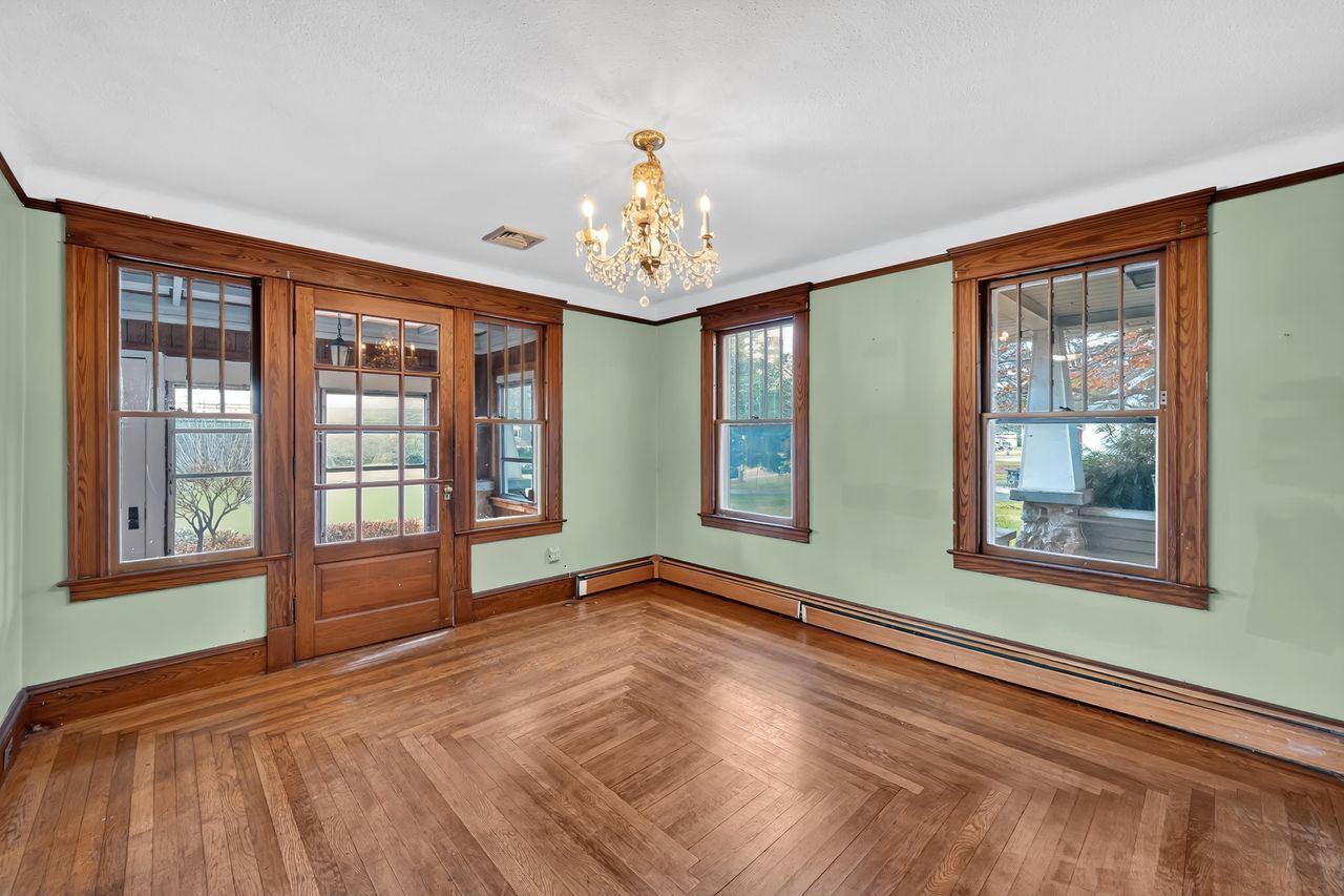 115 West Stafford Road Stafford, CT 06076 - Photo 14 of 39 a view of an empty room with a window