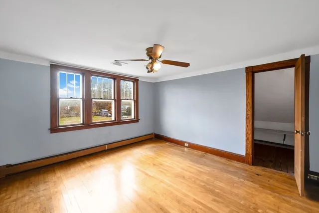 a view of an empty room and window