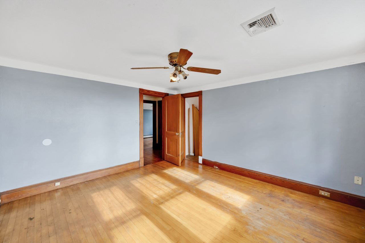 115 West Stafford Road Stafford, CT 06076 - Photo 31 of 39 a view of a livingroom with a ceiling fan and window