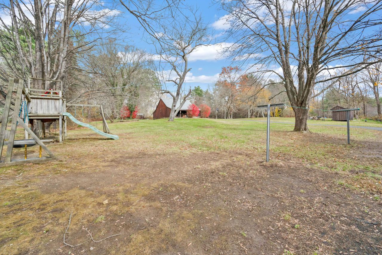 115 West Stafford Road Stafford, CT 06076 - Photo 6 of 39 a view of outdoor space with deck and garden