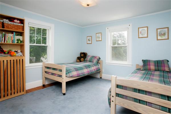 128 Lovell Road Watertown, MA 02472 - Photo 6 of 6 a bedroom with a bed and a window