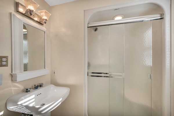 8 Rice Street Hopkinton, MA 01748 - Photo 11 of 16 a bathroom with a sink and shower