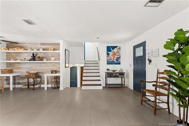 a living room with furniture and a couch
