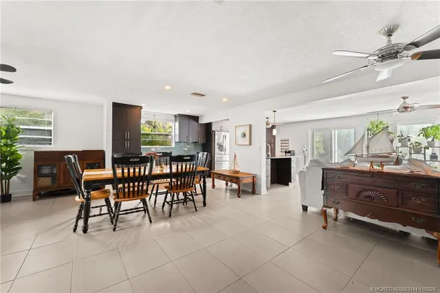 a house with swimming pool in front of it