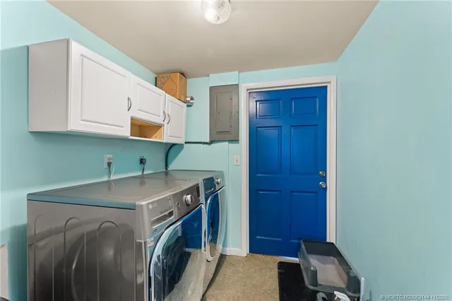 an aerial view of house with swimming pool