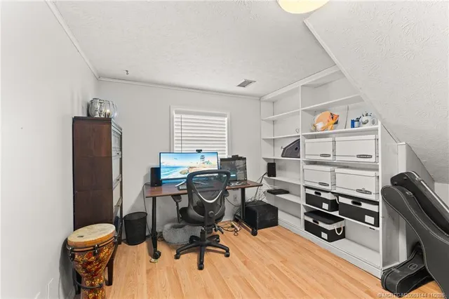 an aerial view of a house with a garden