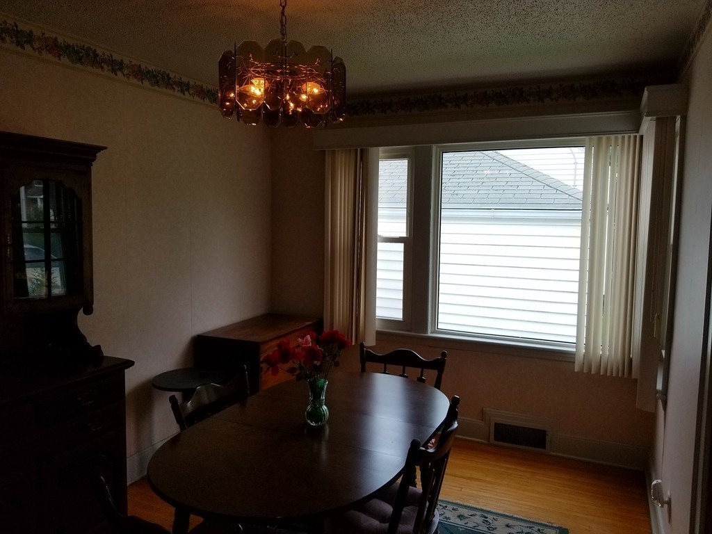 7 Lancaster Street Springfield, MA 01118 - Photo 9 of 25 a dining room with furniture and window