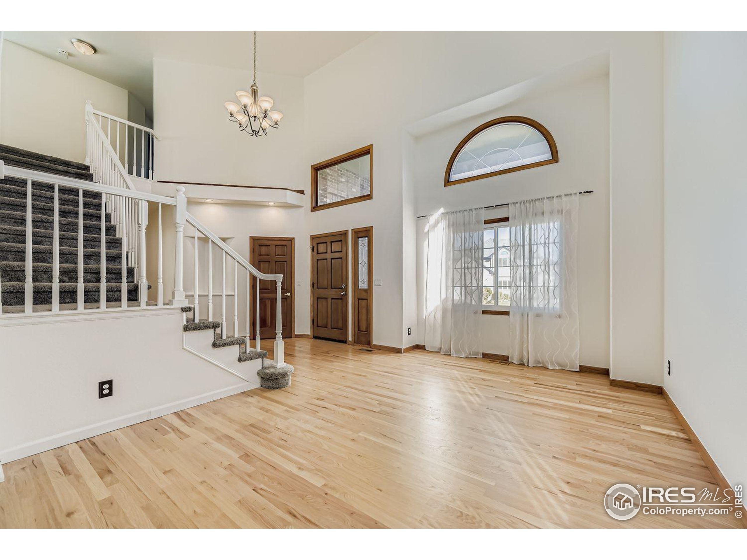 2062 Ridgeview Drive Longmont, CO 80504 - Photo 11 of 29 a view of an entryway with wooden floor