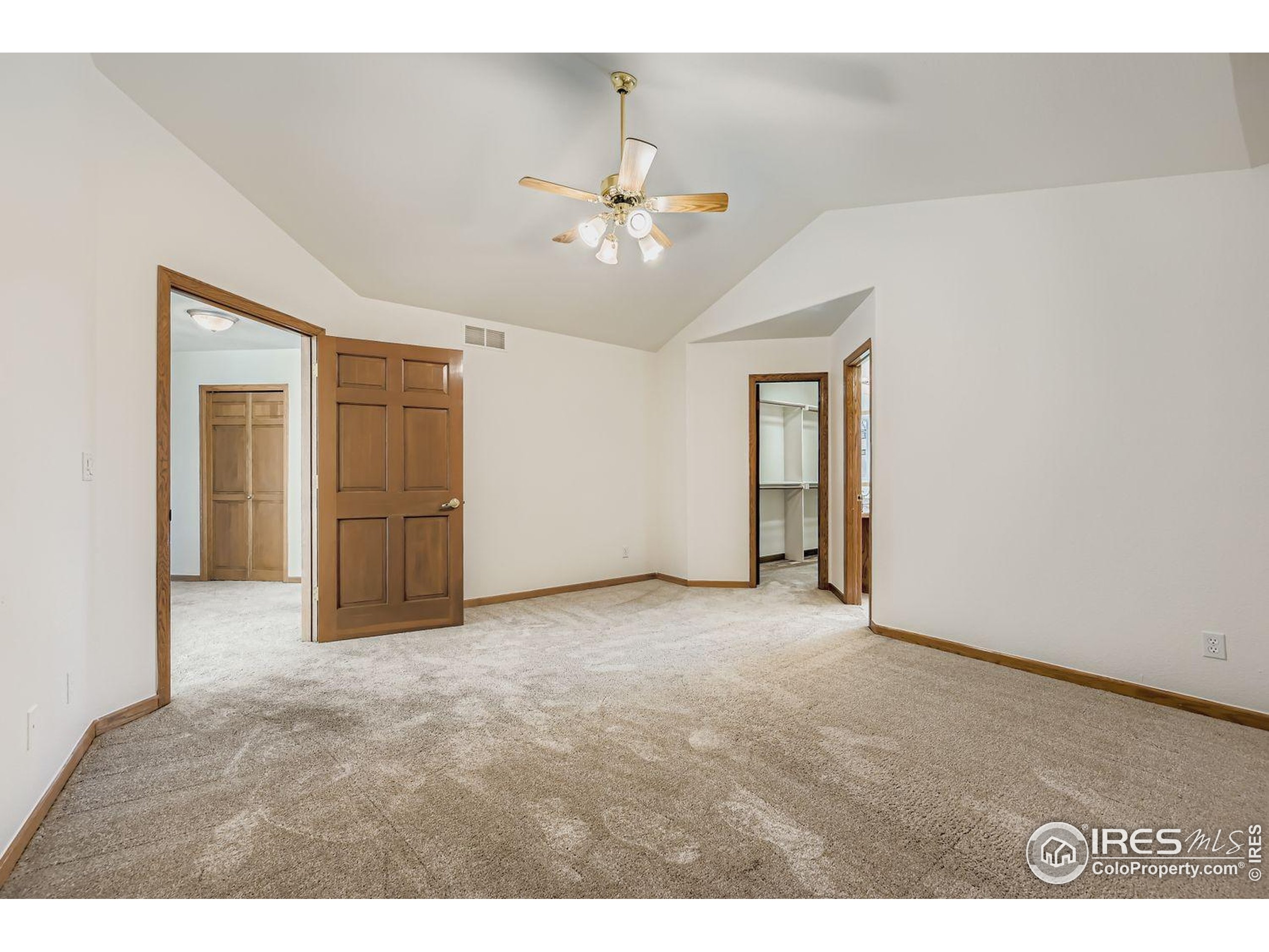 2062 Ridgeview Drive Longmont, CO 80504 - Photo 14 of 29 a view of an empty room with chandelier fan