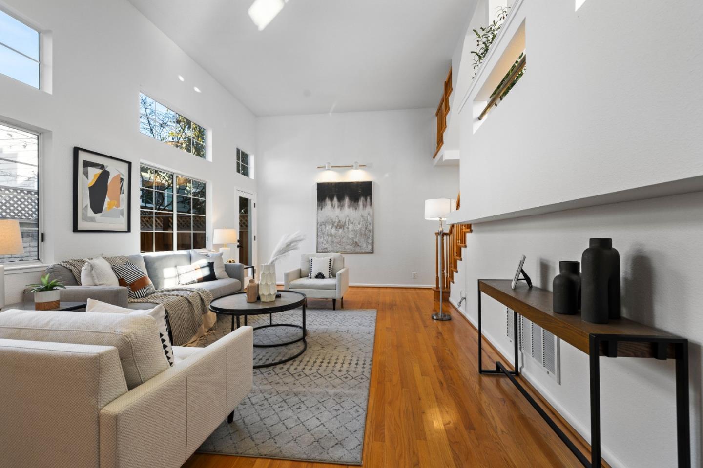 20659 Gardenside Circle Cupertino, CA 95014 - Photo 11 of 55 a living room with furniture and a large window