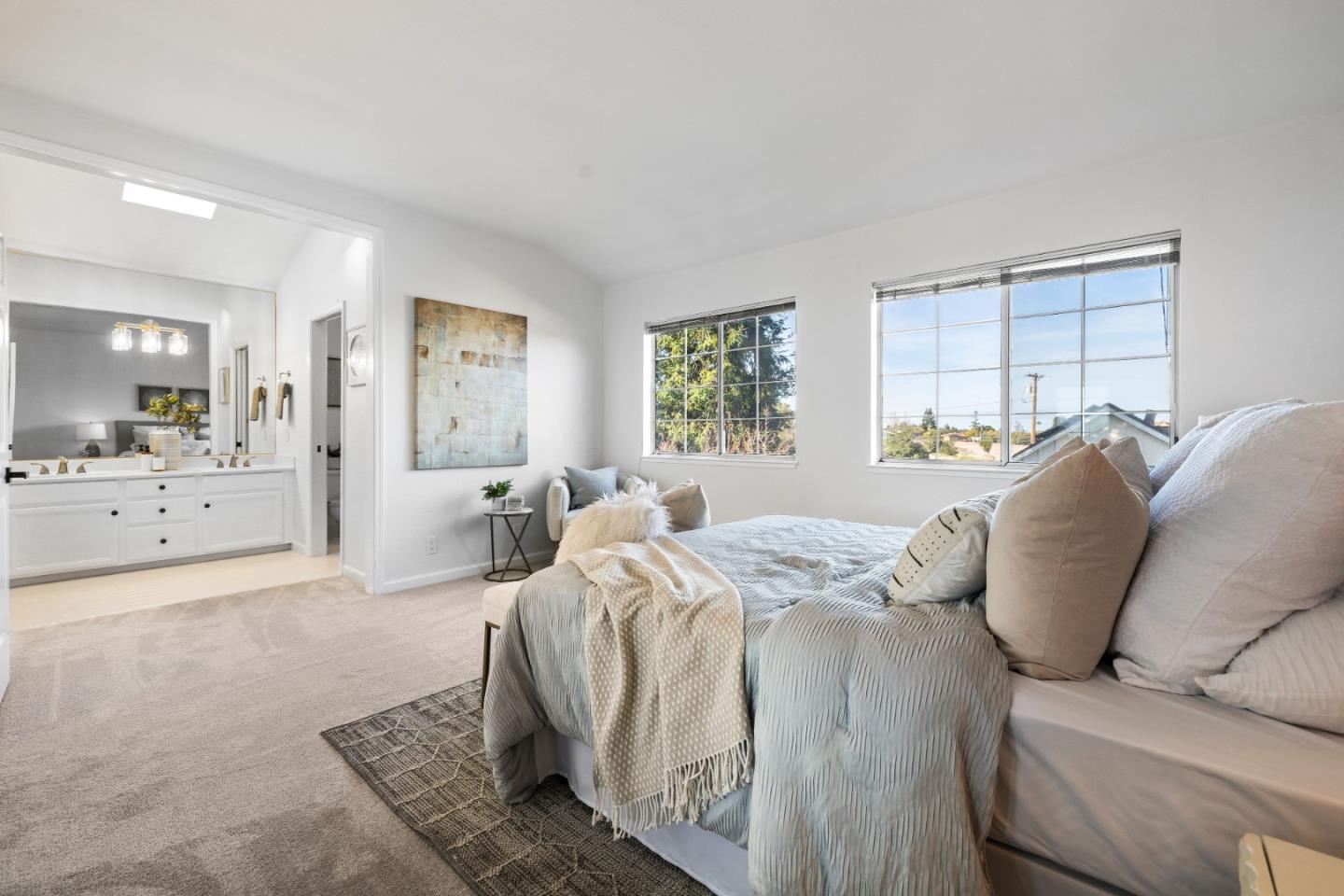 20659 Gardenside Circle Cupertino, CA 95014 - Photo 16 of 55 a bed room with a bed and a large mirror