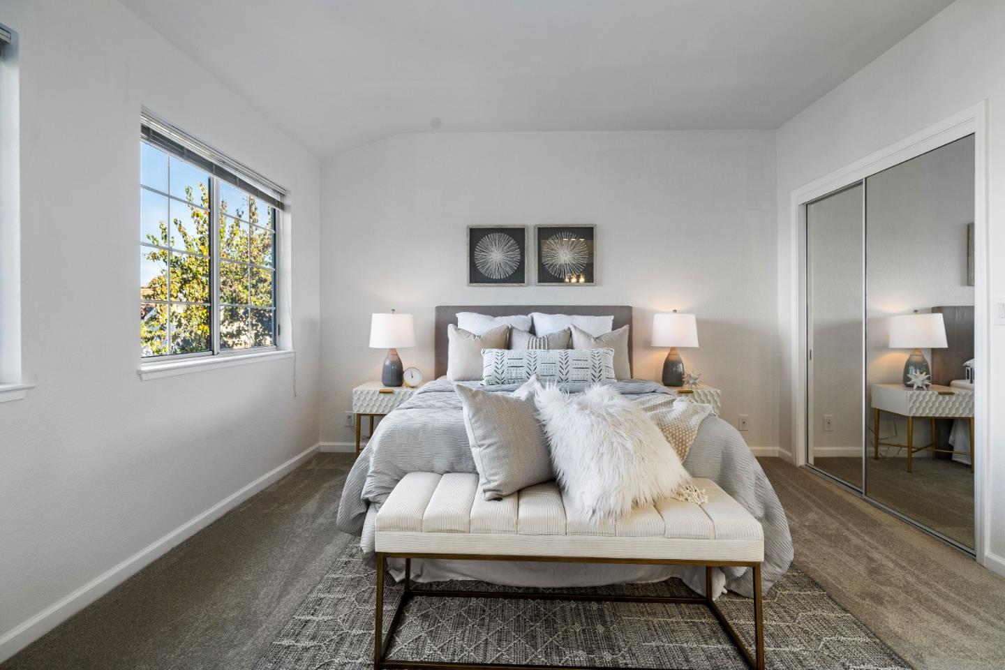 20659 Gardenside Circle Cupertino, CA 95014 - Photo 17 of 55 a bedroom with a bed and a table