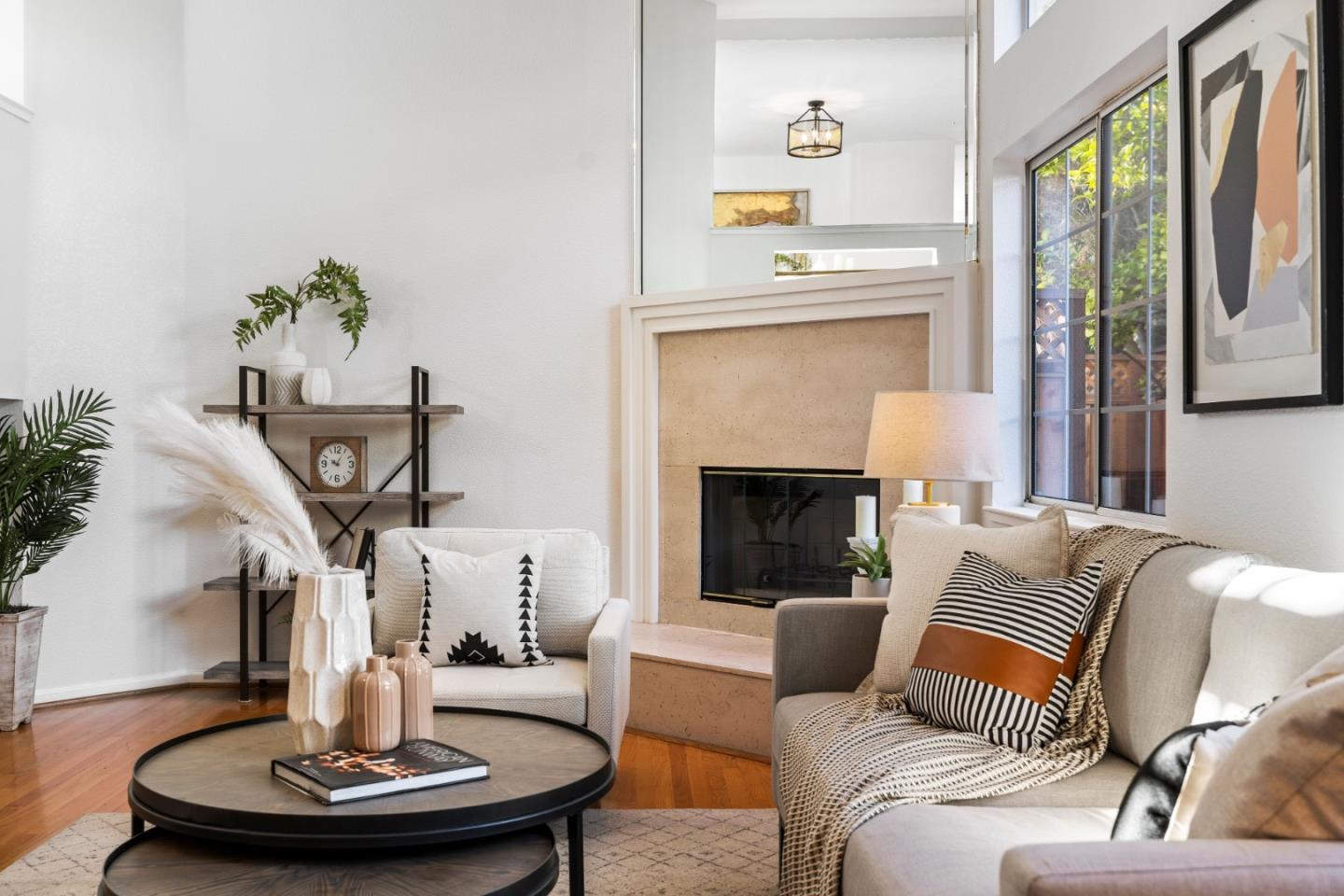 20659 Gardenside Circle Cupertino, CA 95014 - Photo 2 of 55 a living room with furniture and a fireplace