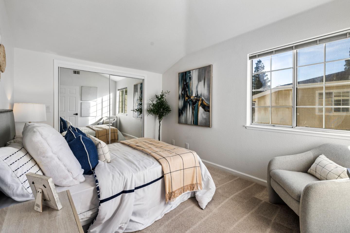 20659 Gardenside Circle Cupertino, CA 95014 - Photo 22 of 55 a bedroom with a bed and glass window