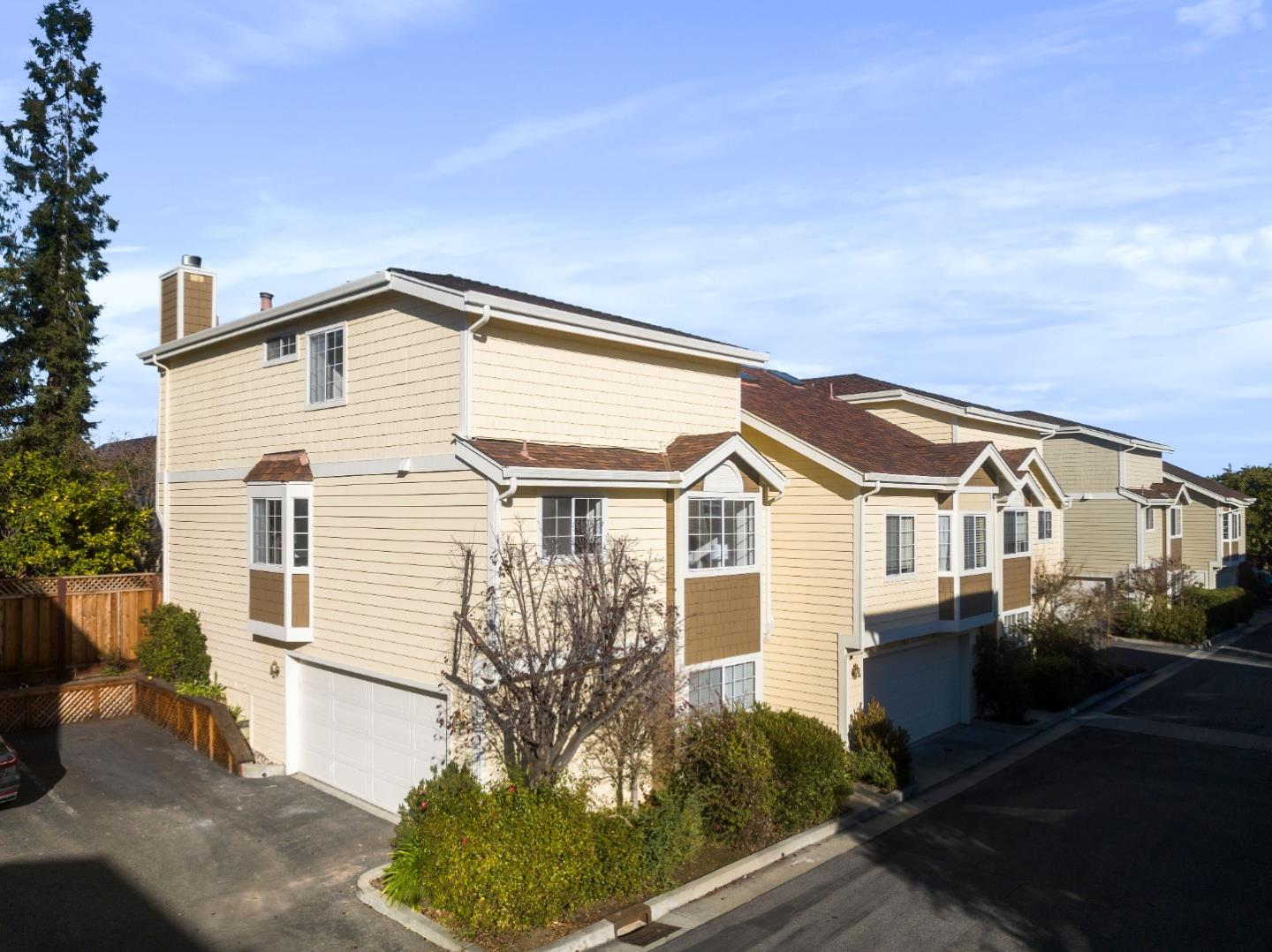 20659 Gardenside Circle Cupertino, CA 95014 - Photo 28 of 55 a front view of a house with a yard